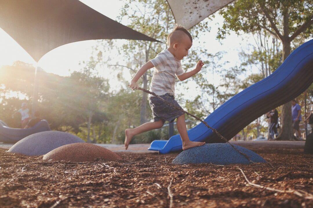 child playing in yard