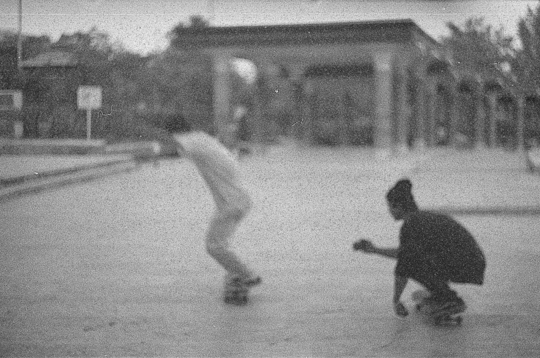 Danish teenagers skateboarding at an outdoor skate park
