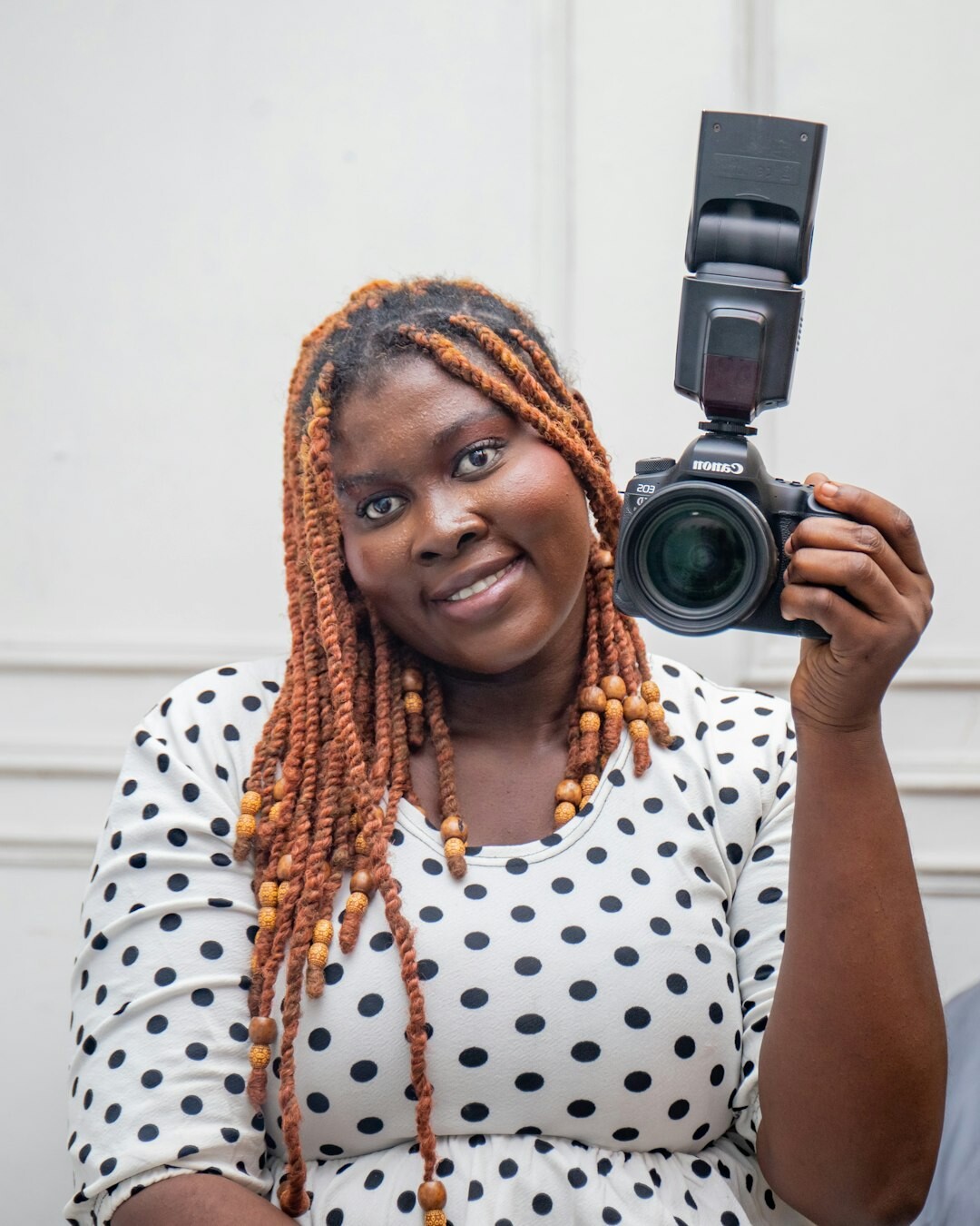 Portrait of a young Danish woman journalist with curly hair